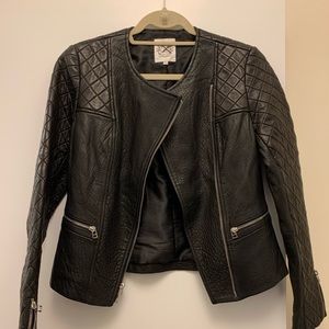 Women’s black leather quilted coat